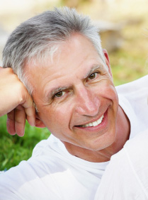 Man shows off his implant supported dentures in Lansdale, PA.