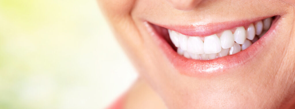 Smiling woman shows off her teeth after her aesthetic dentistry appointment near Montgomeryville, PA.
